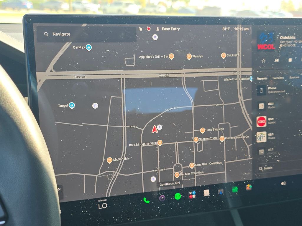 Used 2024 Solid Black Tesla Plaid image 4