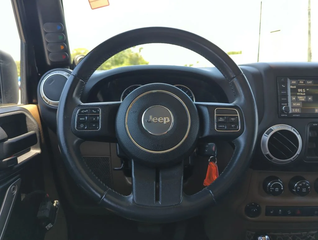 Used 2014 Black Jeep Unlimited Sahara image 17
