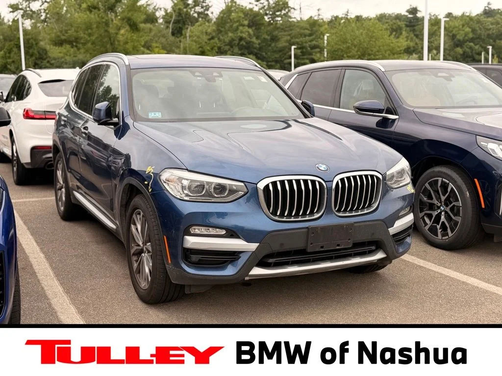 Used 2019 Phytonic Blue Metallic BMW xDrive30i image 1