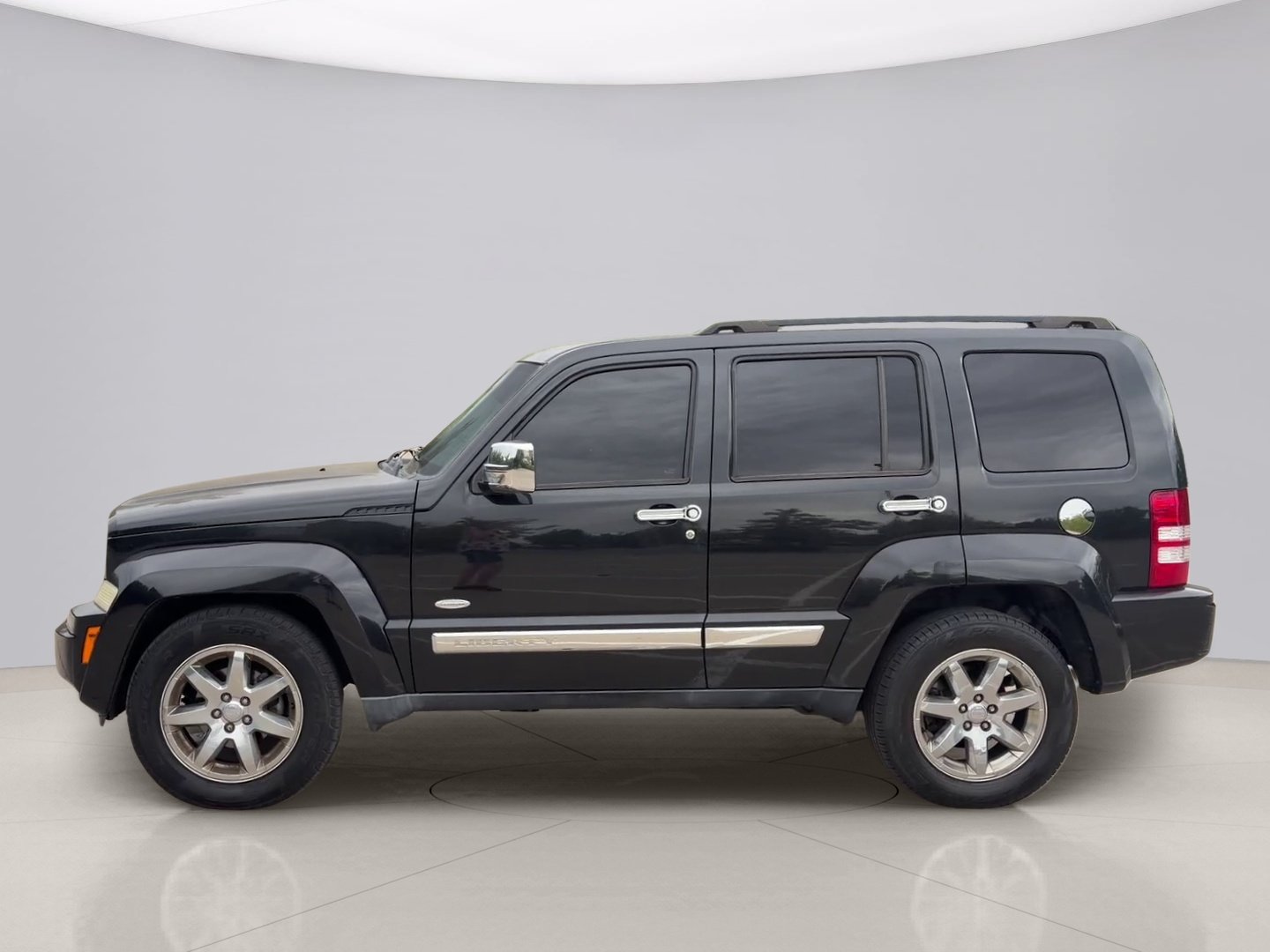Used 2012 Black Jeep SPORT image 2