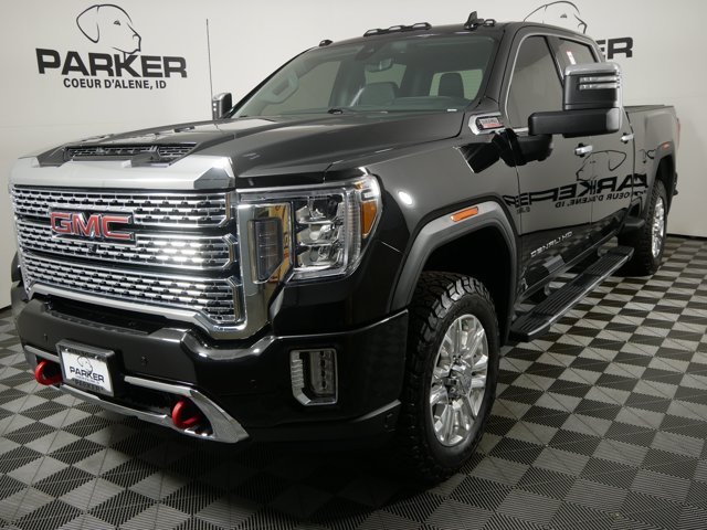 Used 2021 Ebony Twilight Metallic GMC Crew Cab Denali w/ Ultimate Pkg image 1