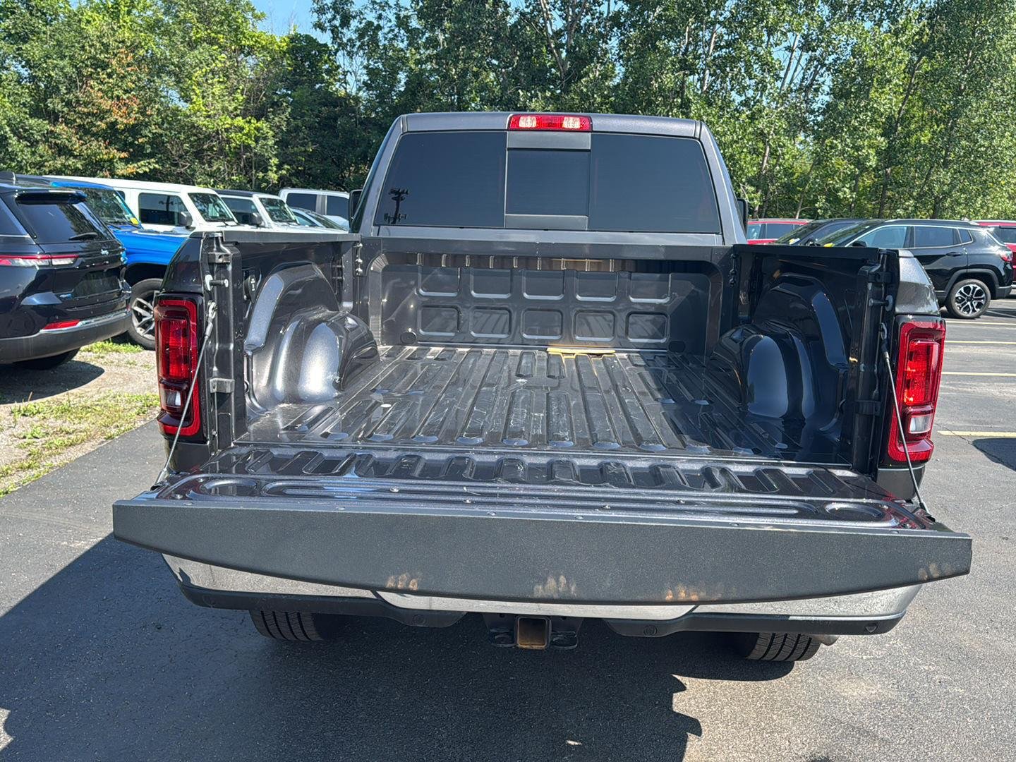 Used 2025 Granite Crystal Metallic Clearcoat Ram Tradesman image 9