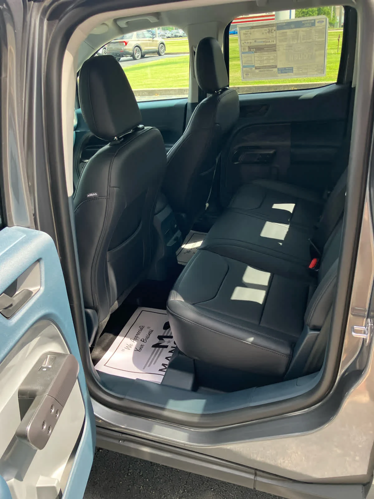 New 2026 Carbonized Gray Metallic Ford LARIAT image 14