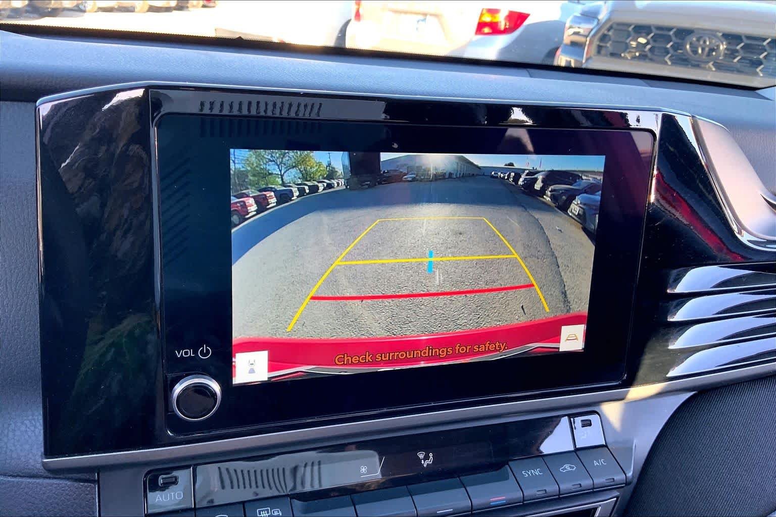 Used 2025 Supersonic Red Toyota LE image 26