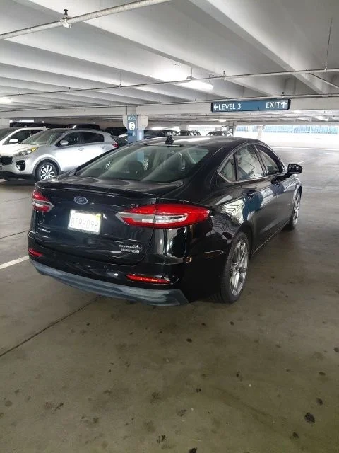 Used 2019 Black Ford Titanium image 4