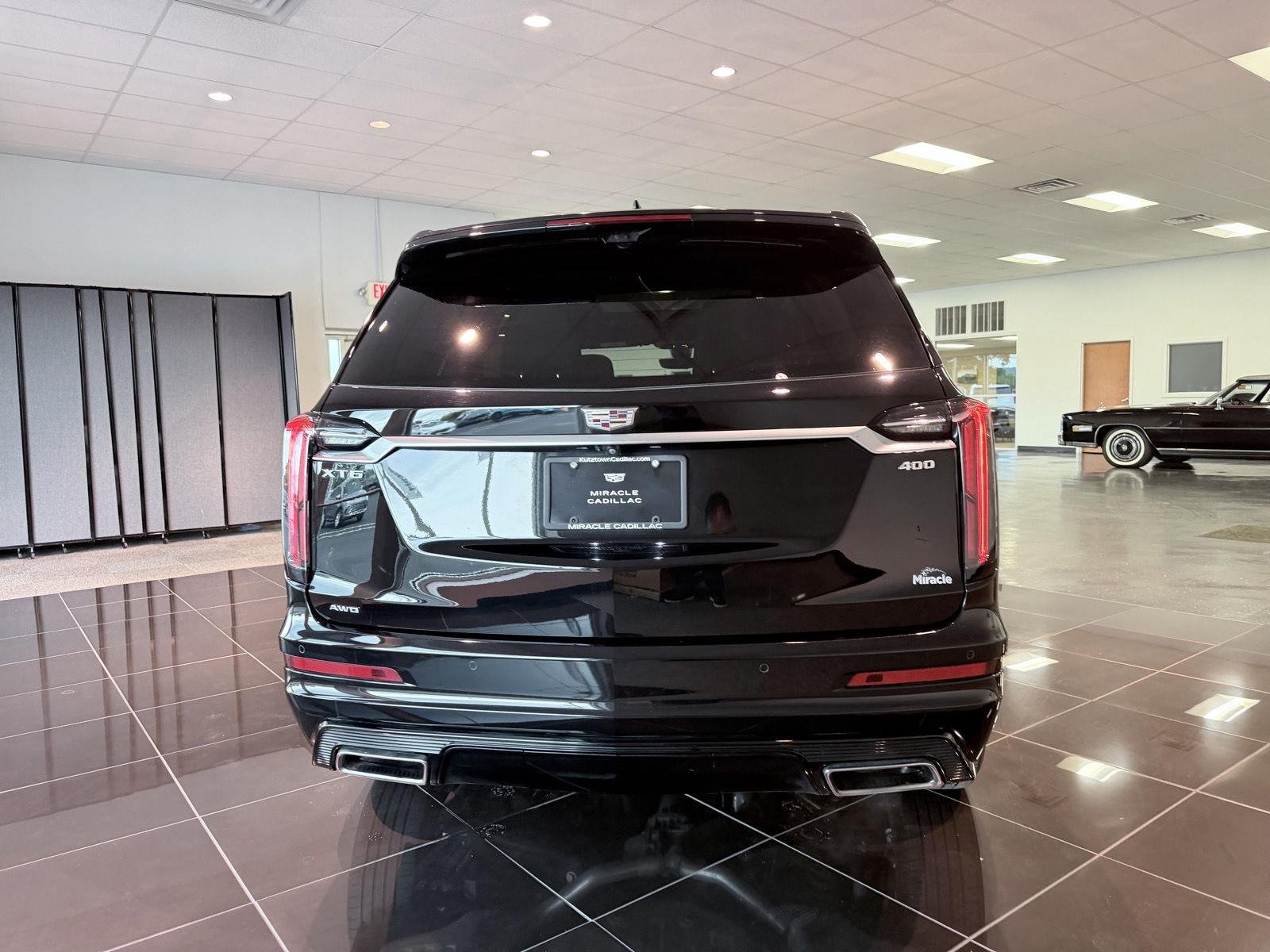 Used 2024 Stellar Black Metallic Cadillac Sport image 13