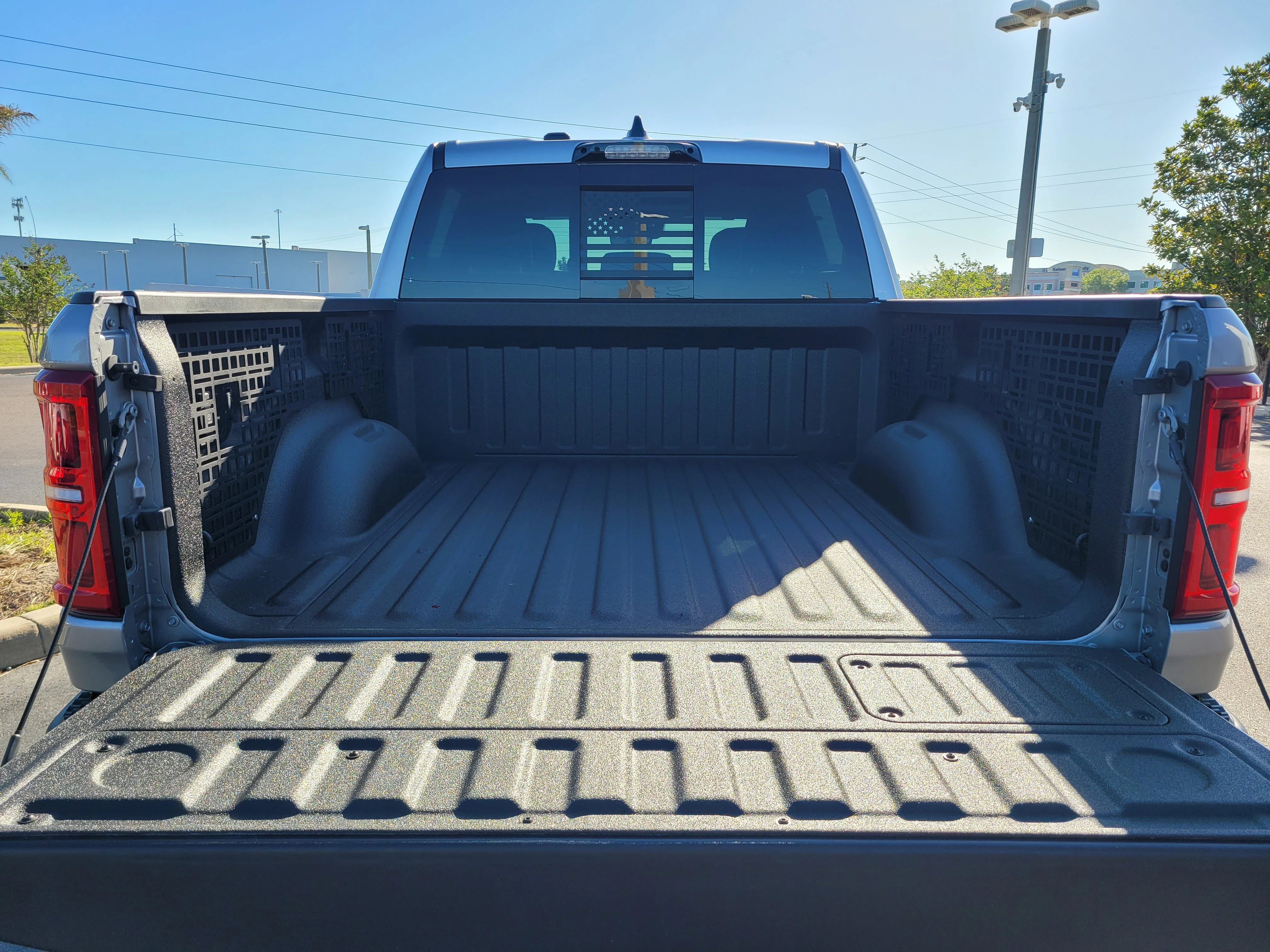 Used 2025 Billet Silver Metallic Clearcoat Ram RHO image 12