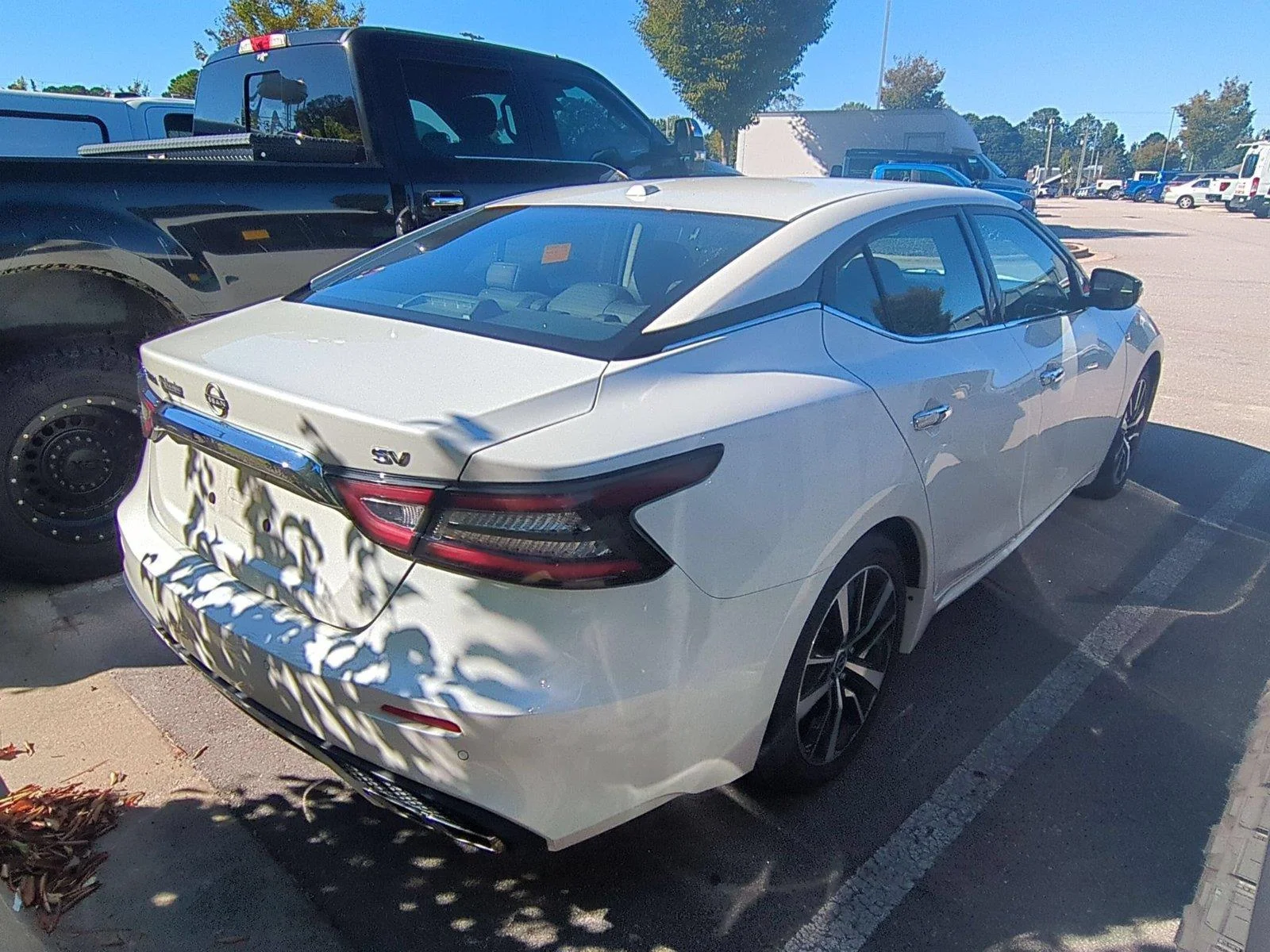 Used 2023 Pearl White Tricoat Nissan SV image 4