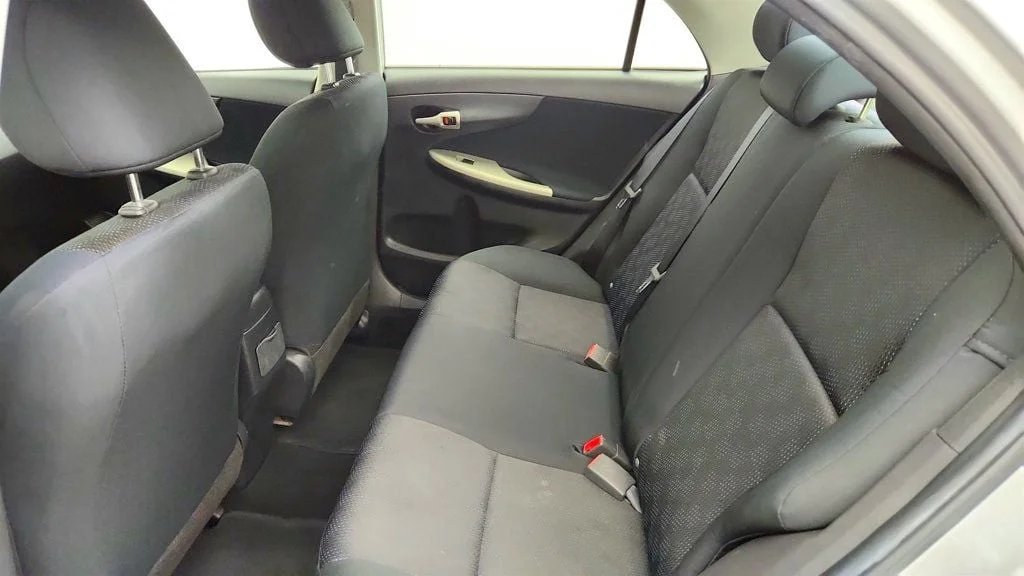 Used 2010 Classic Silver Metallic Toyota 4dr Sedan Manual S w/ Power Moonroof & 16