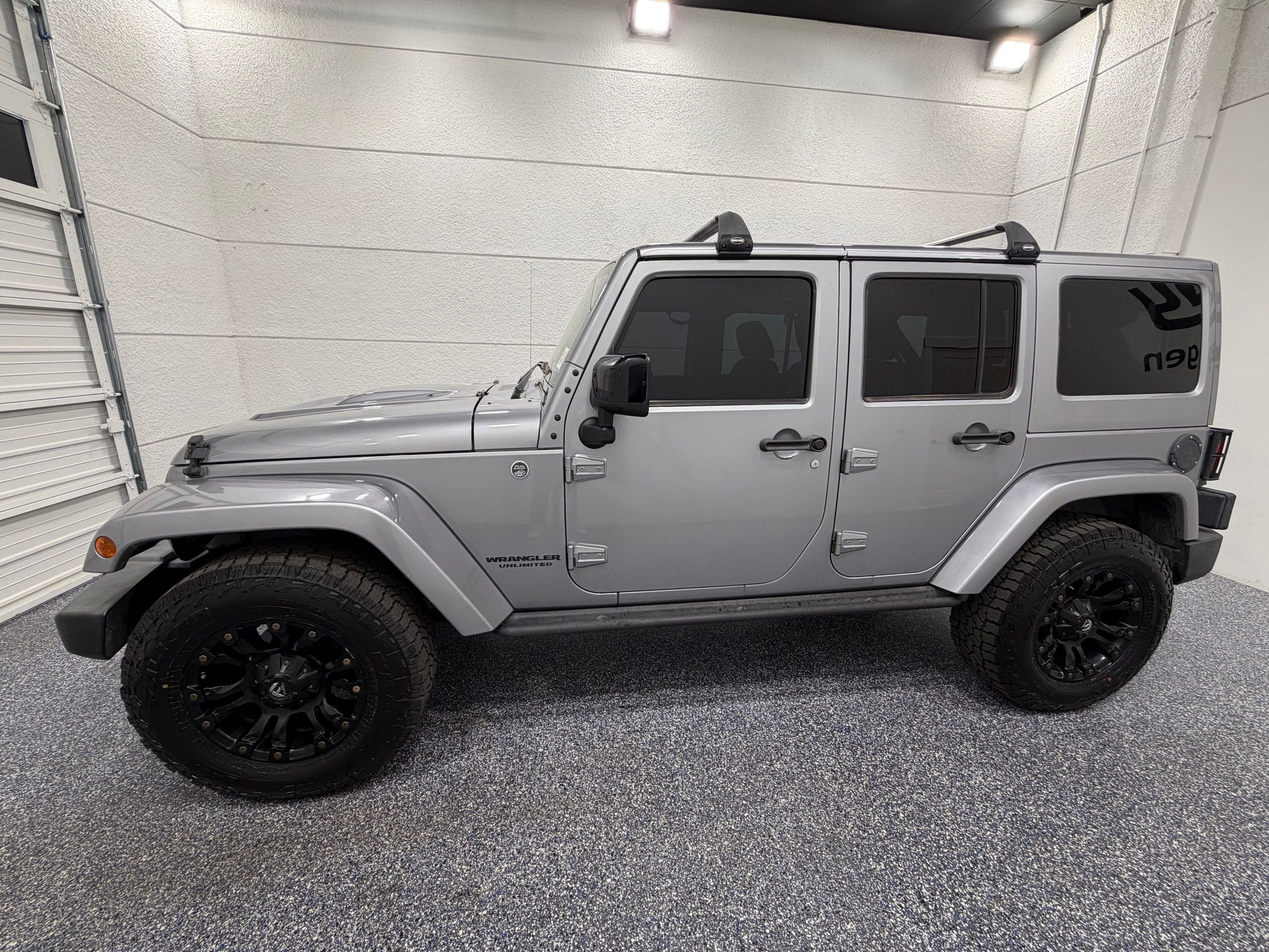 Used 2015 Jeep Wrangler Unlimited Altitude with VIN 1C4BJWEG7FL757516 for sale in St. George, UT