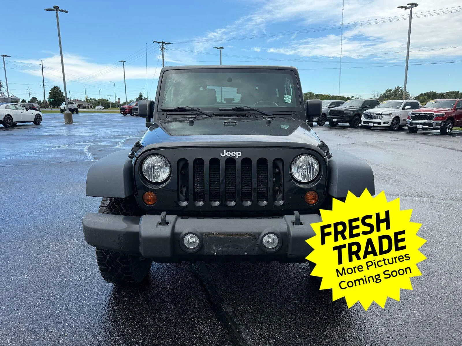 Used 2012 Jeep Wrangler Sport with VIN 1C4GJWAG1CL186497 for sale in Charles City, IA