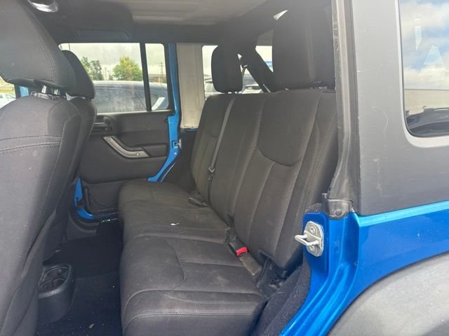 Used 2015 Blue Jeep Unlimited Sport image 19