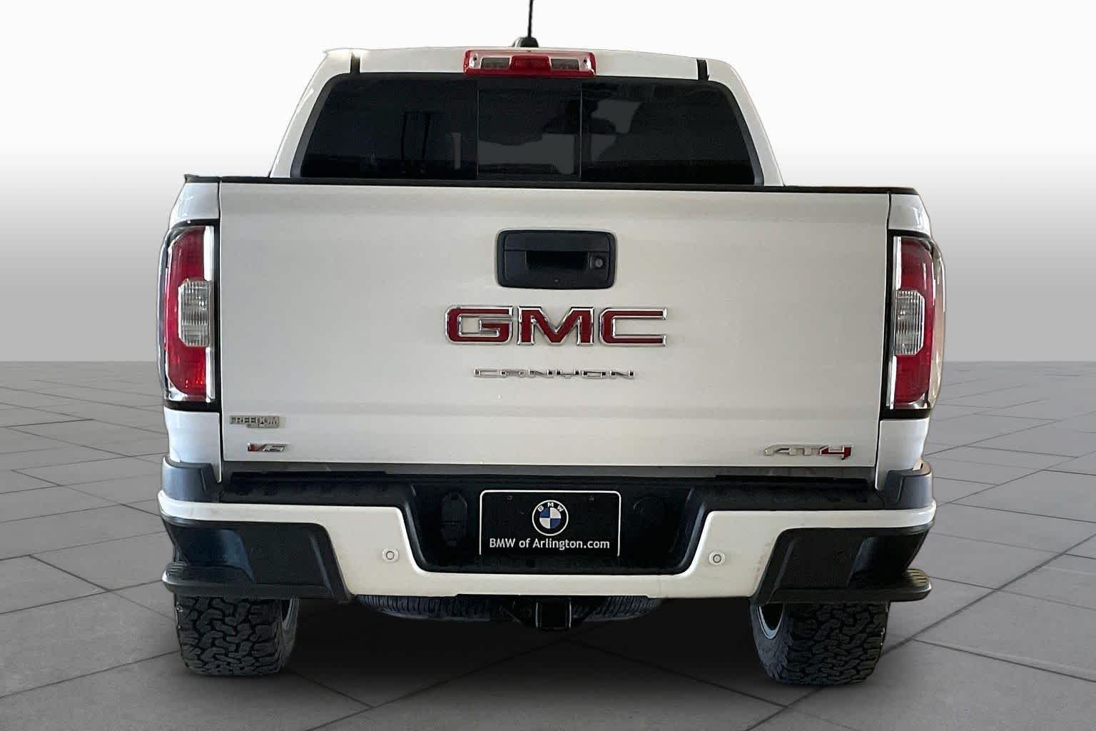 Used 2021 Summit White GMC 4WD AT4 w/Leather image 4