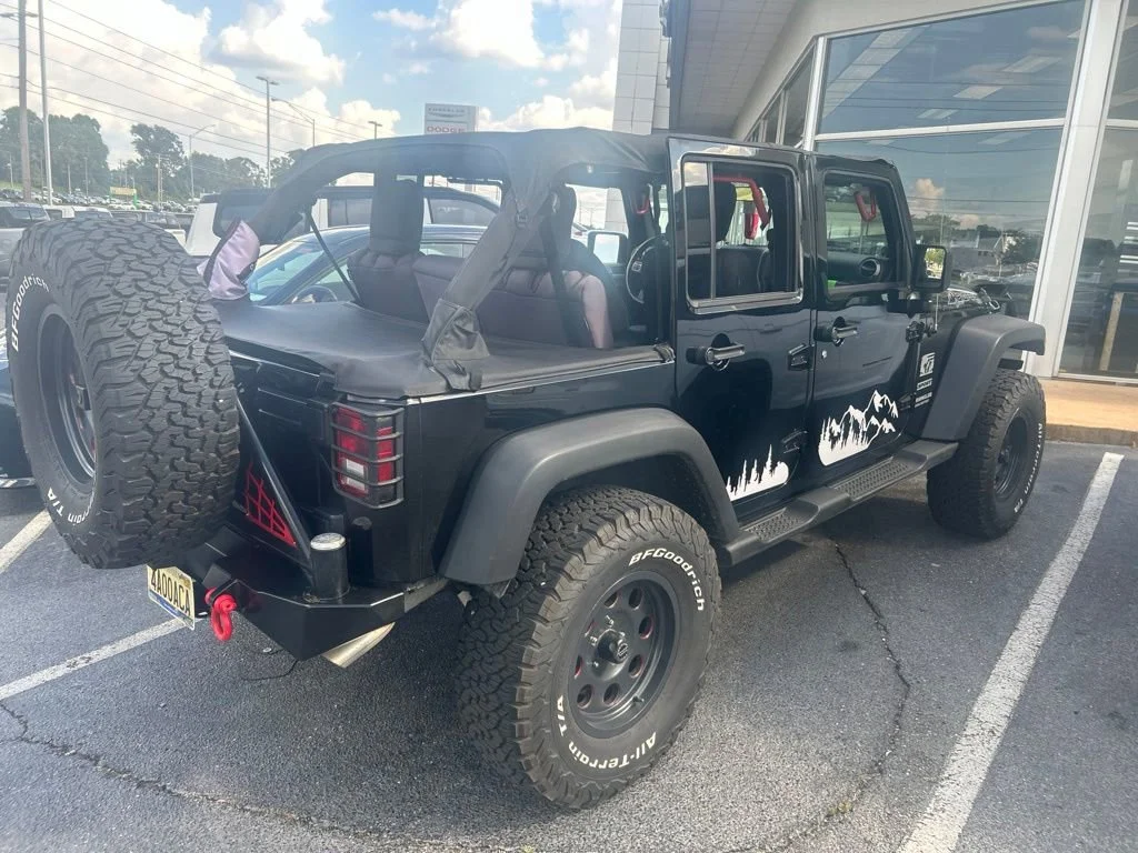 Used 2012 Black Jeep Sport image 6