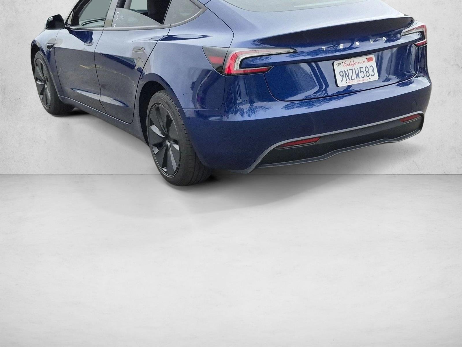 Used 2024 Deep Blue Metallic Tesla  image 7
