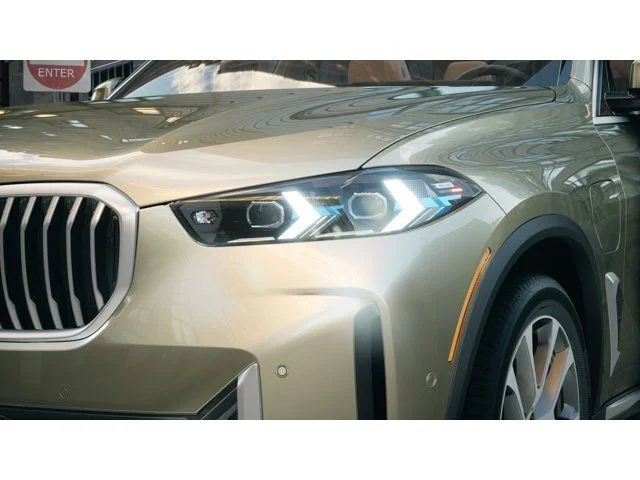 New 2026 Manhattan Green Metallic BMW xDrive50e image 6