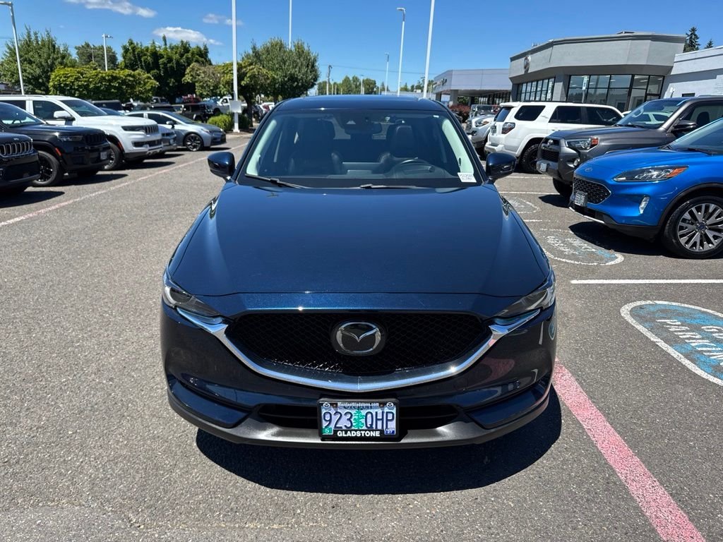 Used 2021 Deep Crystal Blue Mica Mazda Grand Touring image 1