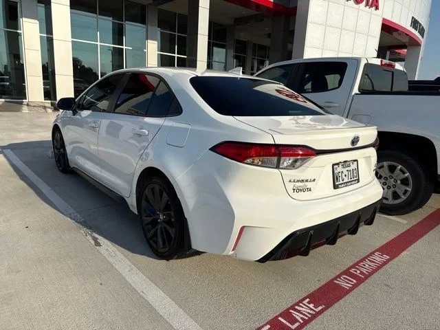 Used 2025 White Toyota LE image 2
