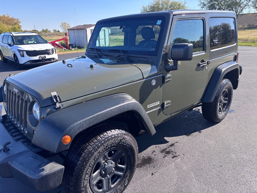 Used 2015 Tank Clearcoat Jeep Sport image 9