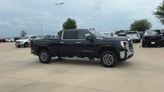 New 2026 Titanium Rush Metallic GMC SLT image 3