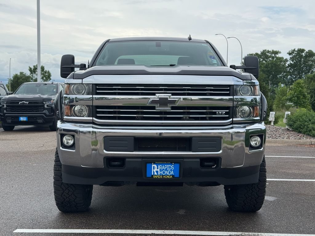 Used 2015 Chevrolet Silverado 2500HD LTZ with VIN 1GC2KWEGXFZ140203 for sale in Coon Rapids, Minnesota