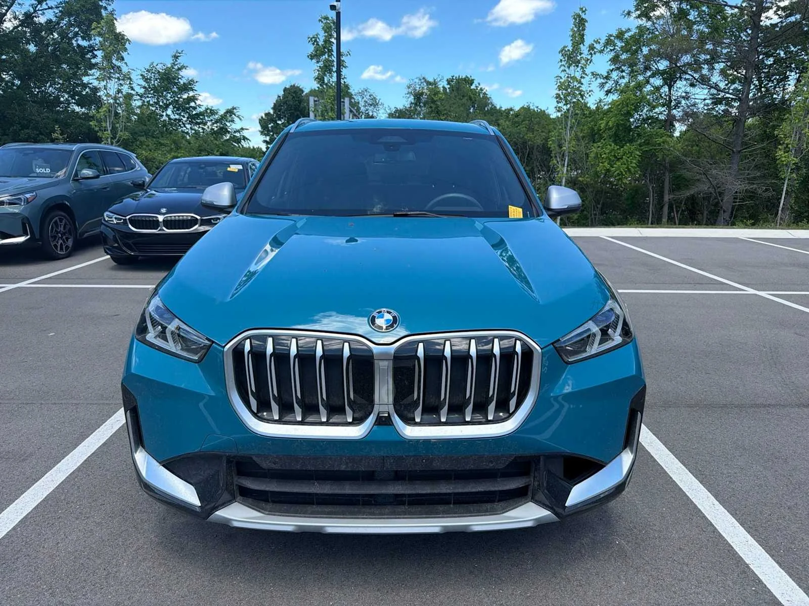 Certified Used 2023 Blue Bay Lagoon Metallic BMW xDrive28i image 2