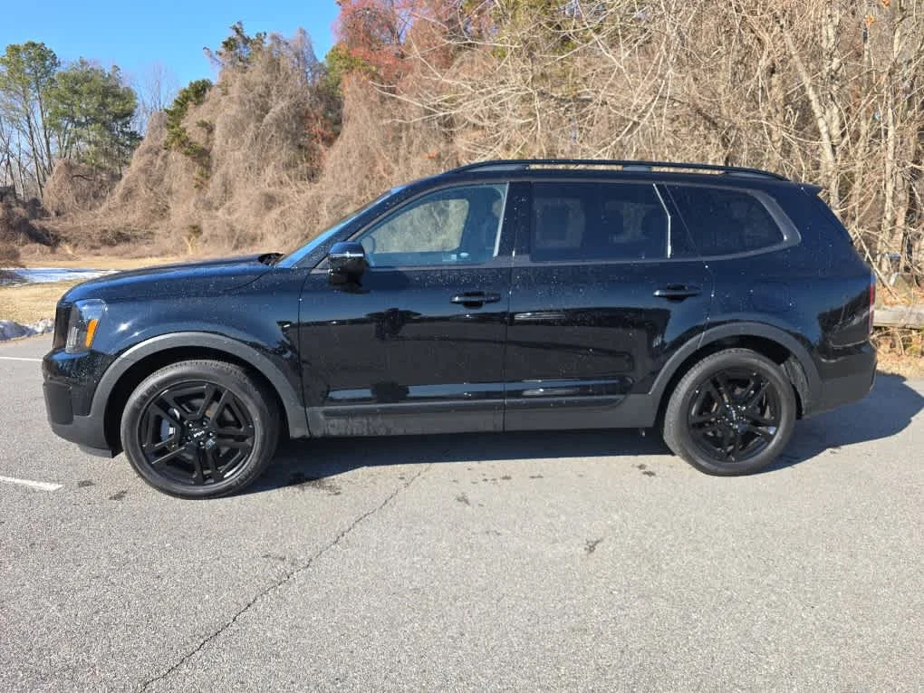 Used 2024 Ebony Black Kia SX Prestige X-Line image 3