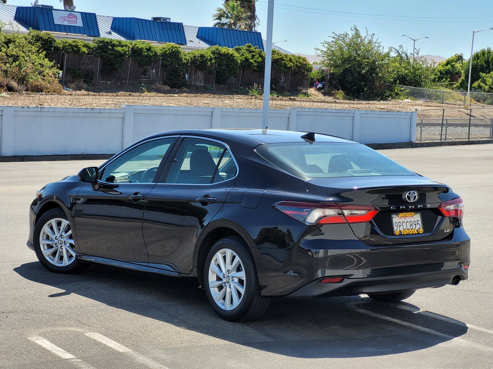 Used 2024 Black Toyota LE image 6