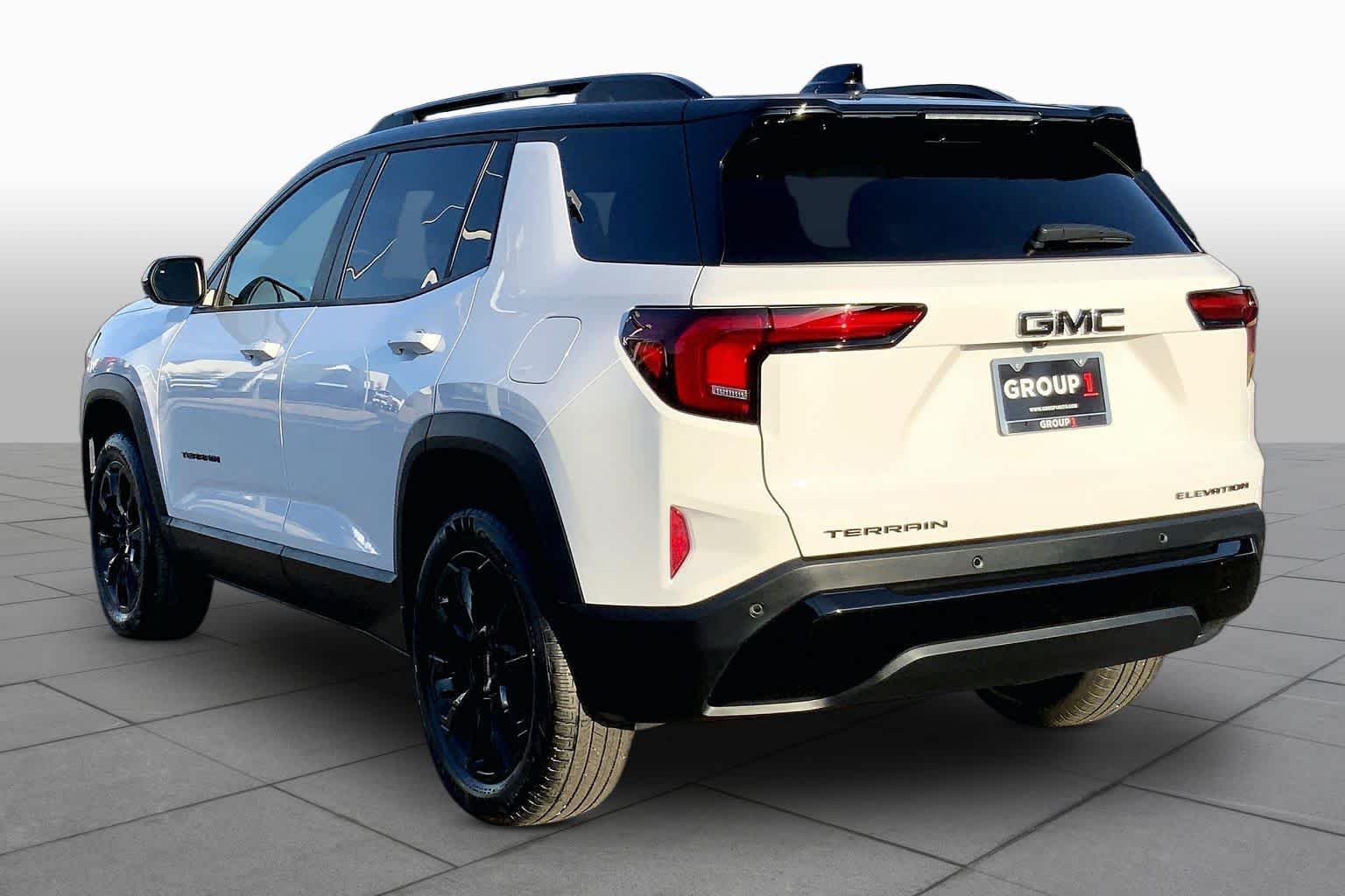 Used 2026 Summit White GMC FWD Elevation image 12