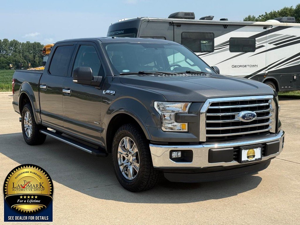Used 2015 Magnetic Metallic Ford 2WD SuperCrew 145" XLT image 3