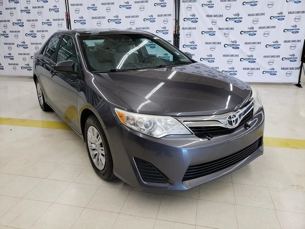 Used 2013 Magnetic Gray Metallic Toyota LE image 1