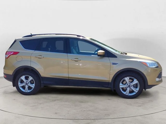 Used 2015 Gold Ford SE image 4