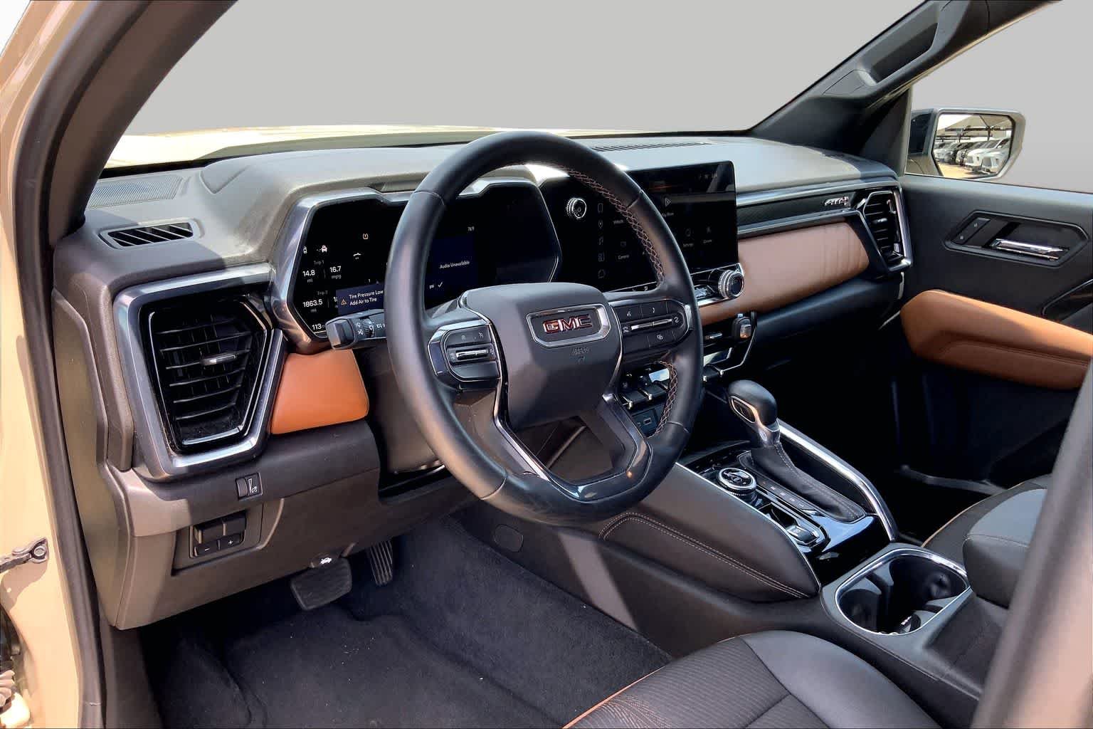 Used 2024 Desert Sand Metallic GMC 4WD AT4 image 17