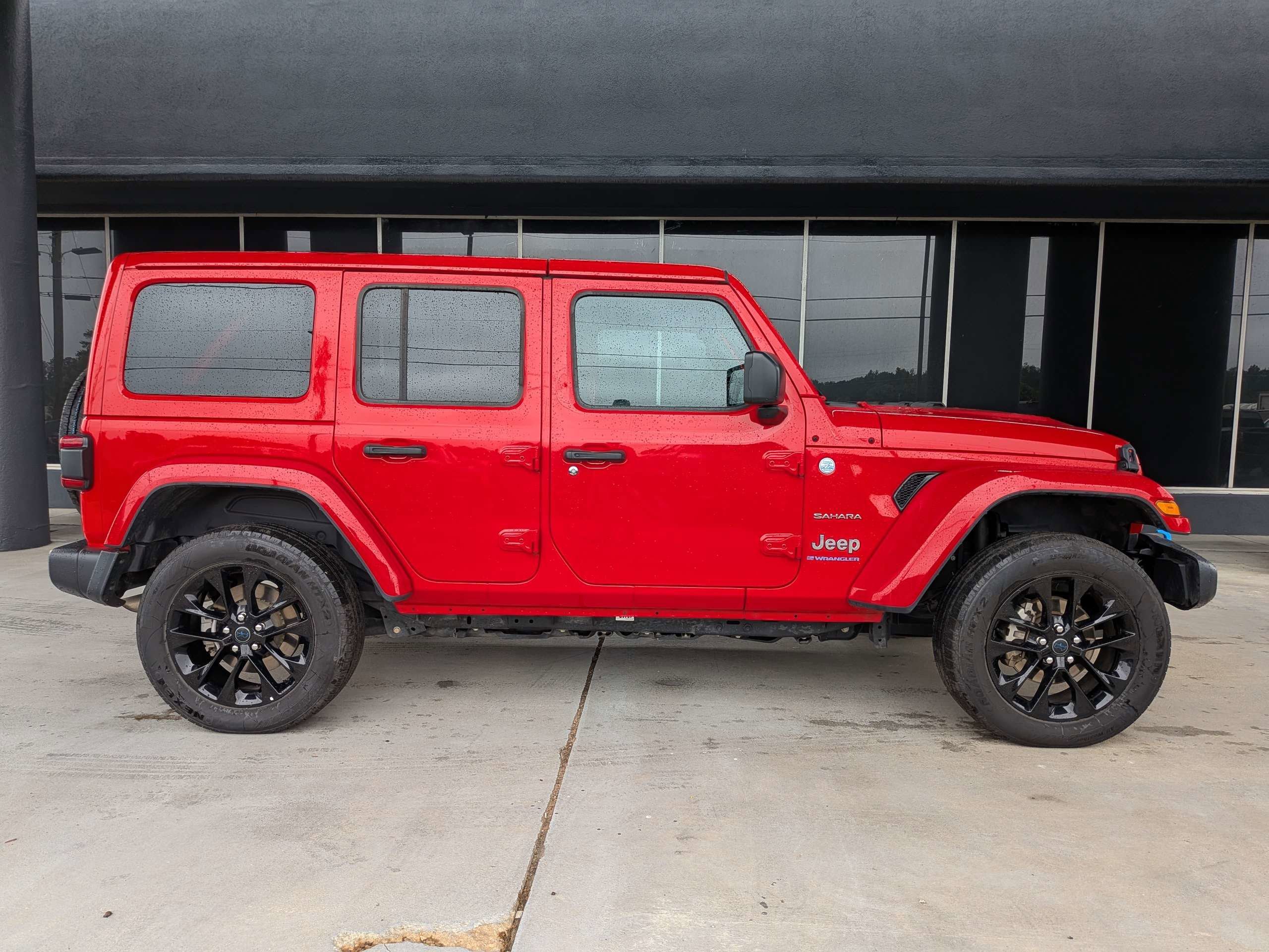 Used 2024 Red Jeep Sahara 4xe image 2
