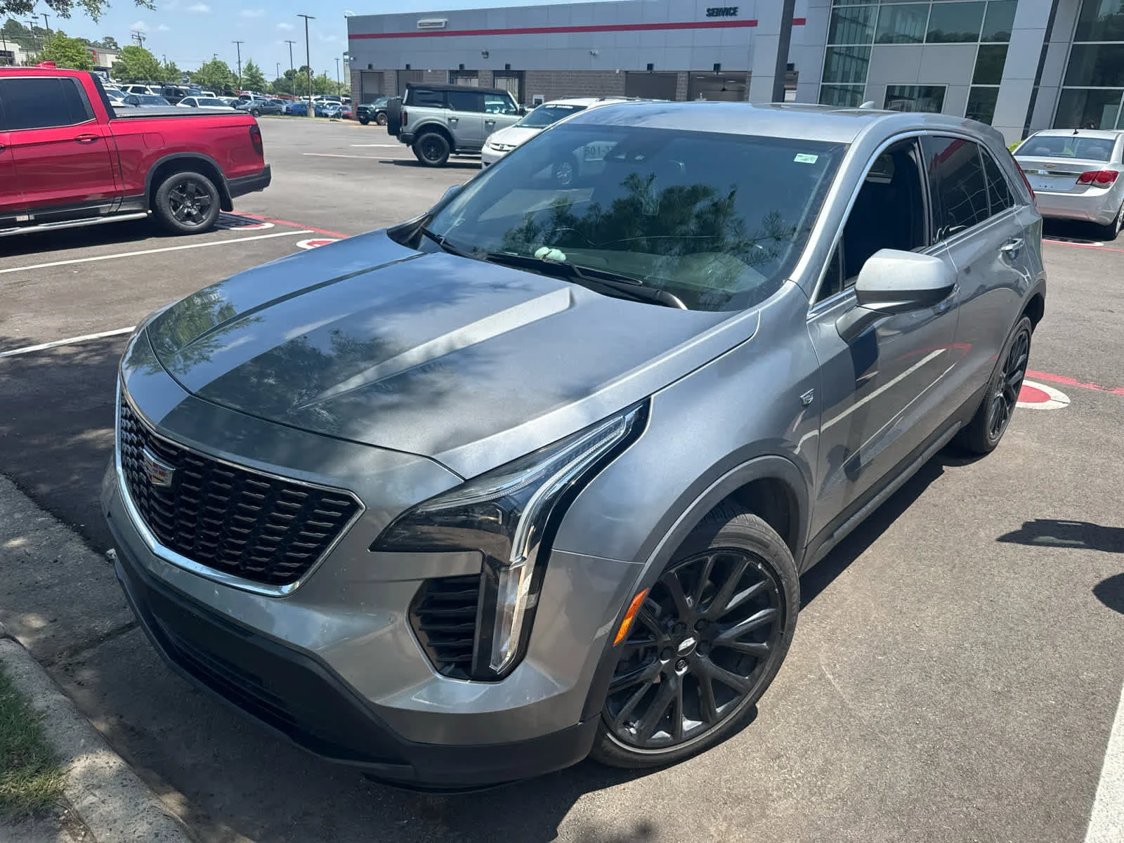 Used 2023 Argent Silver Metallic Cadillac FWD Luxury image 2