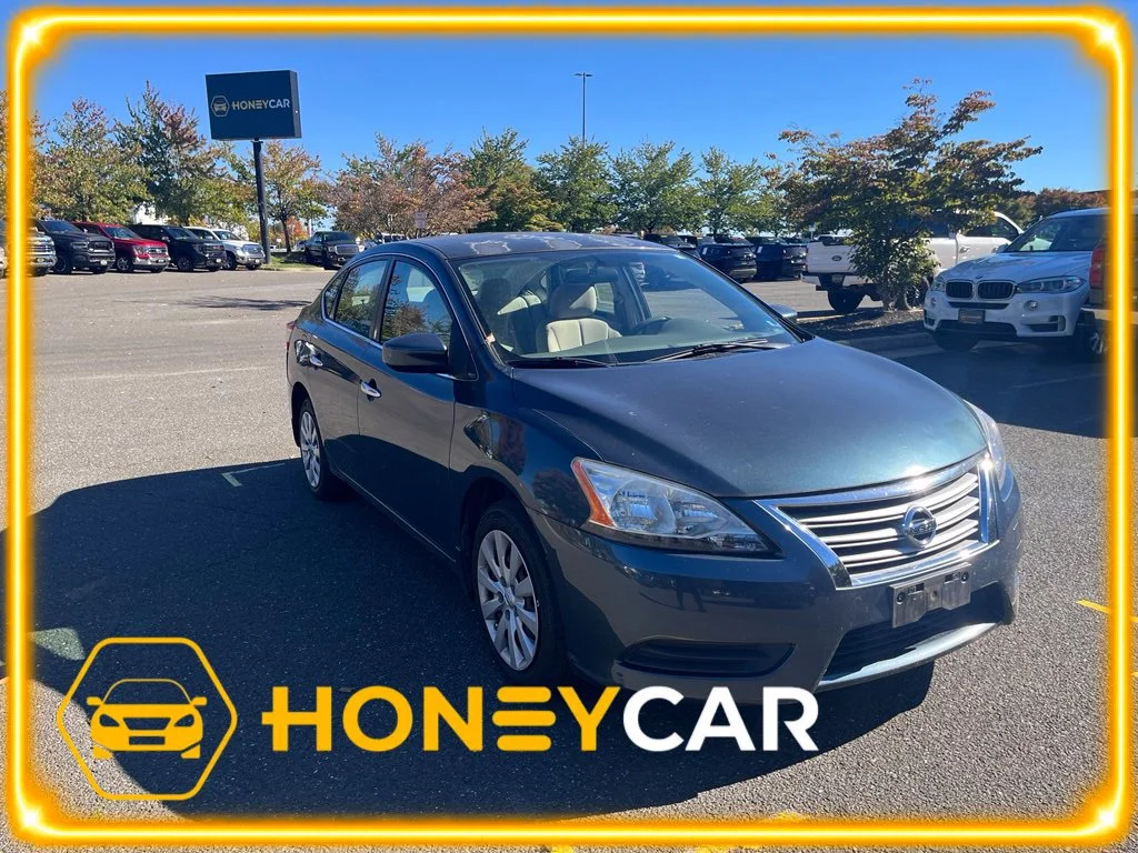 Used 2014 Blue Nissan SV image 1