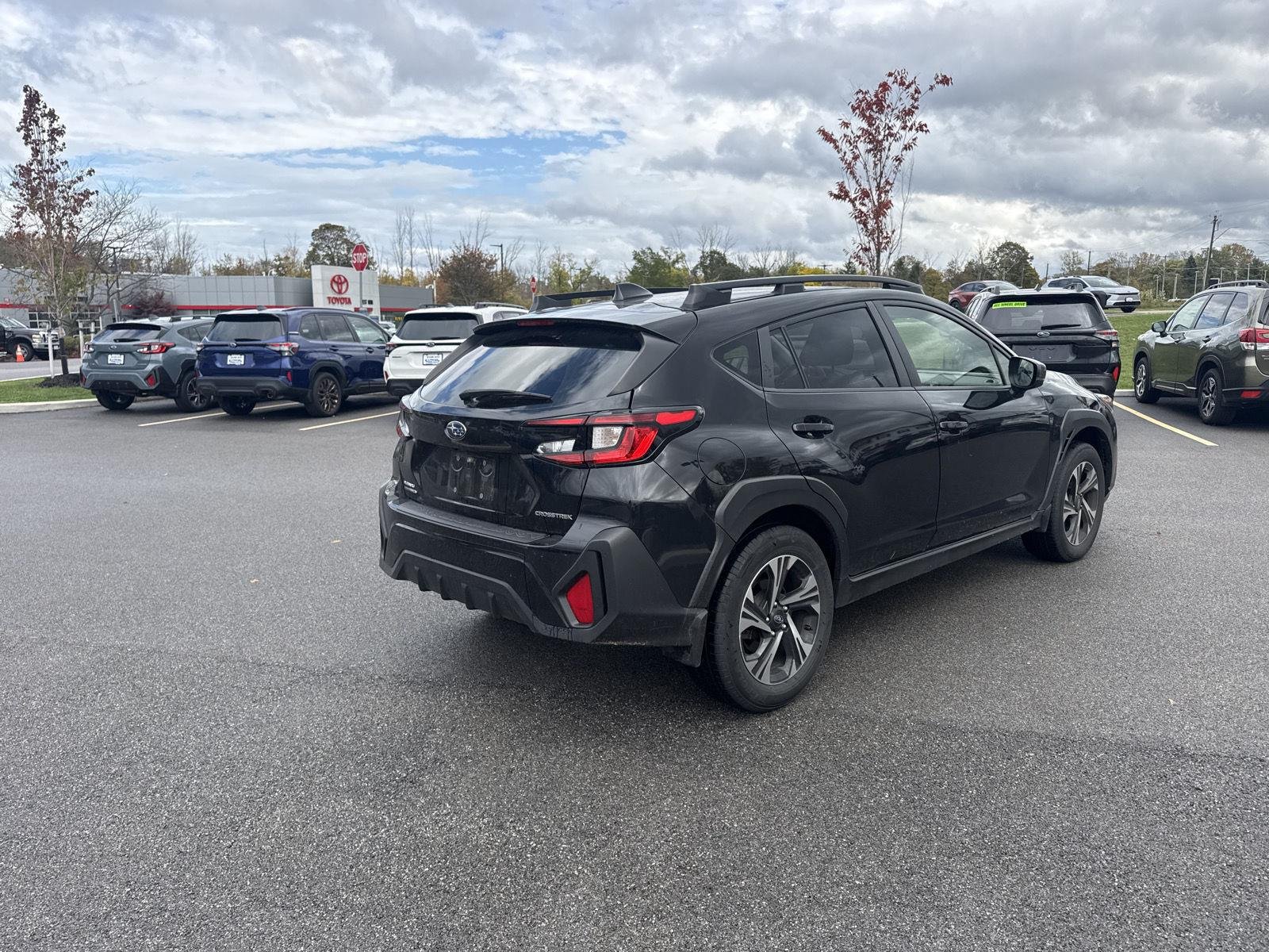 Used 2024 Crystal Black Silica Subaru Premium image 9