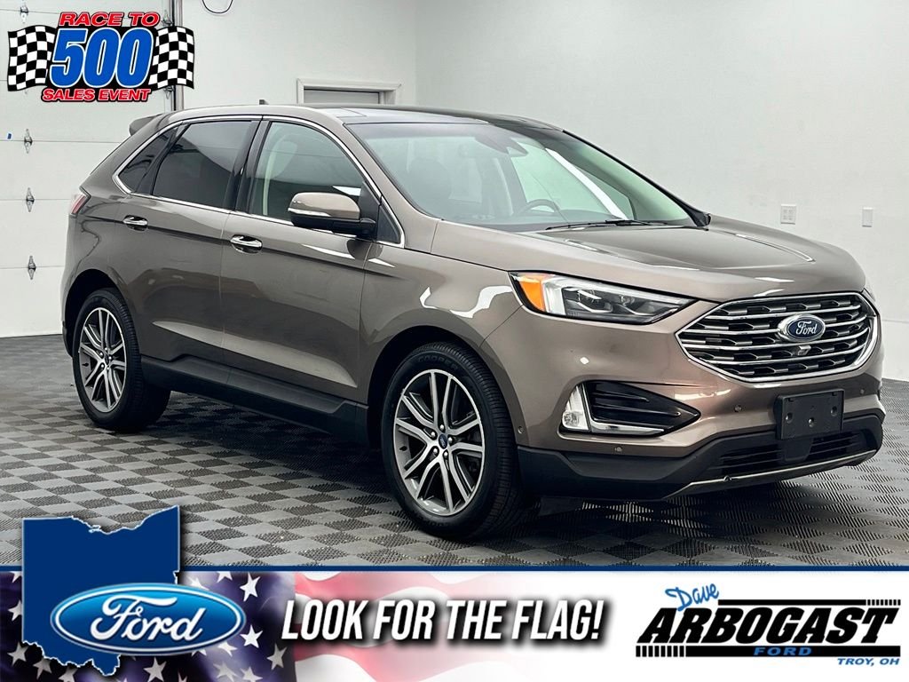 Used 2019 Stone Gray Metallic Ford Titanium image 1