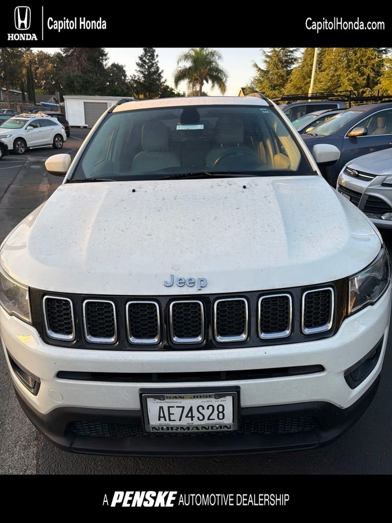 Used 2019 White Clearcoat Jeep Latitude image 1