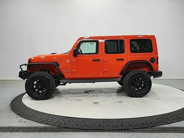 Used 2018 Orange Jeep Unlimited Sahara image 4