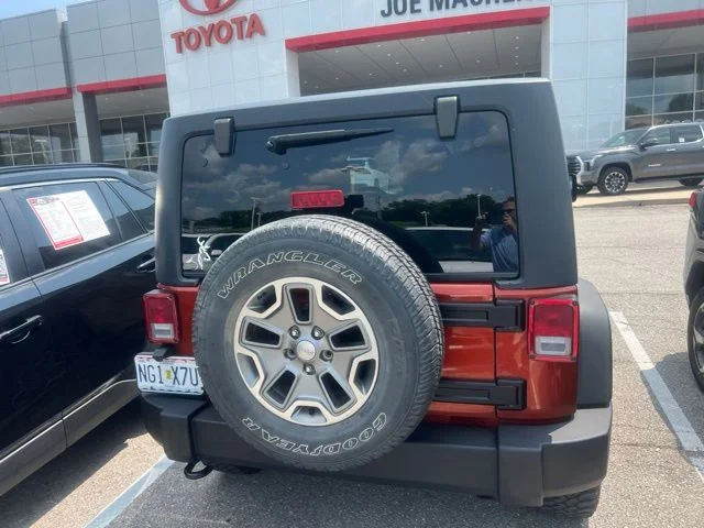 Used 2014 Orange Jeep Sport image 7