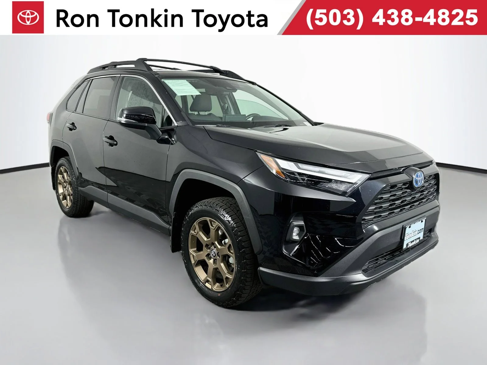 Used 2024 Midnight Black Metallic Toyota Woodland Edition image 1