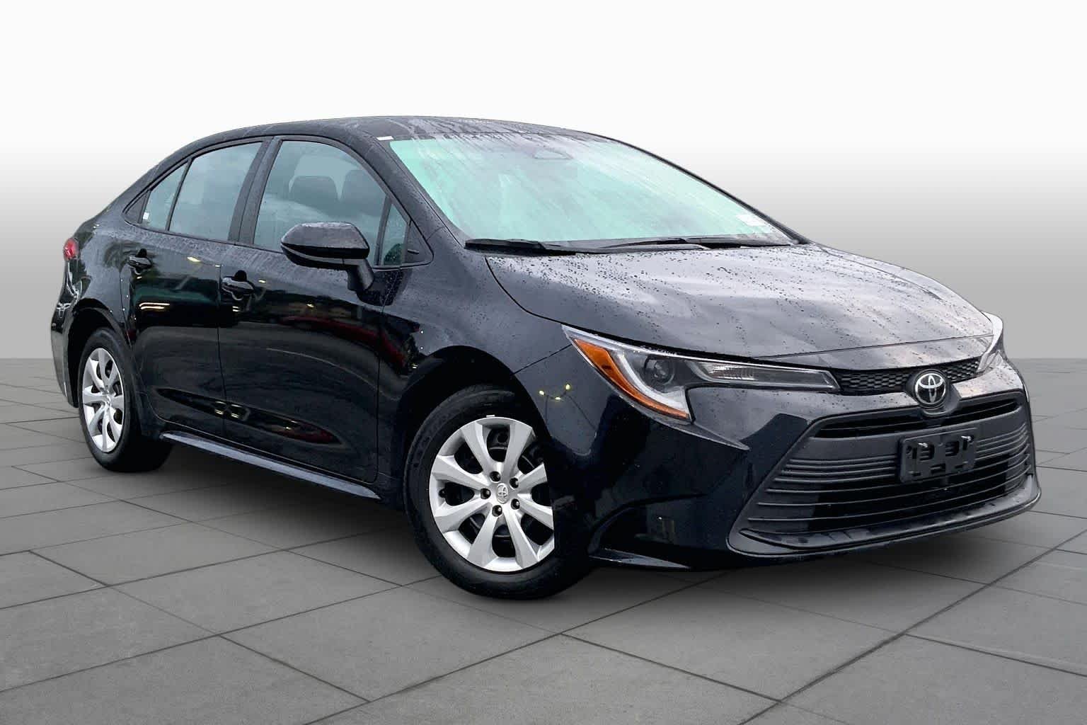 Used 2024 Midnight Black Metallic Toyota LE image 3
