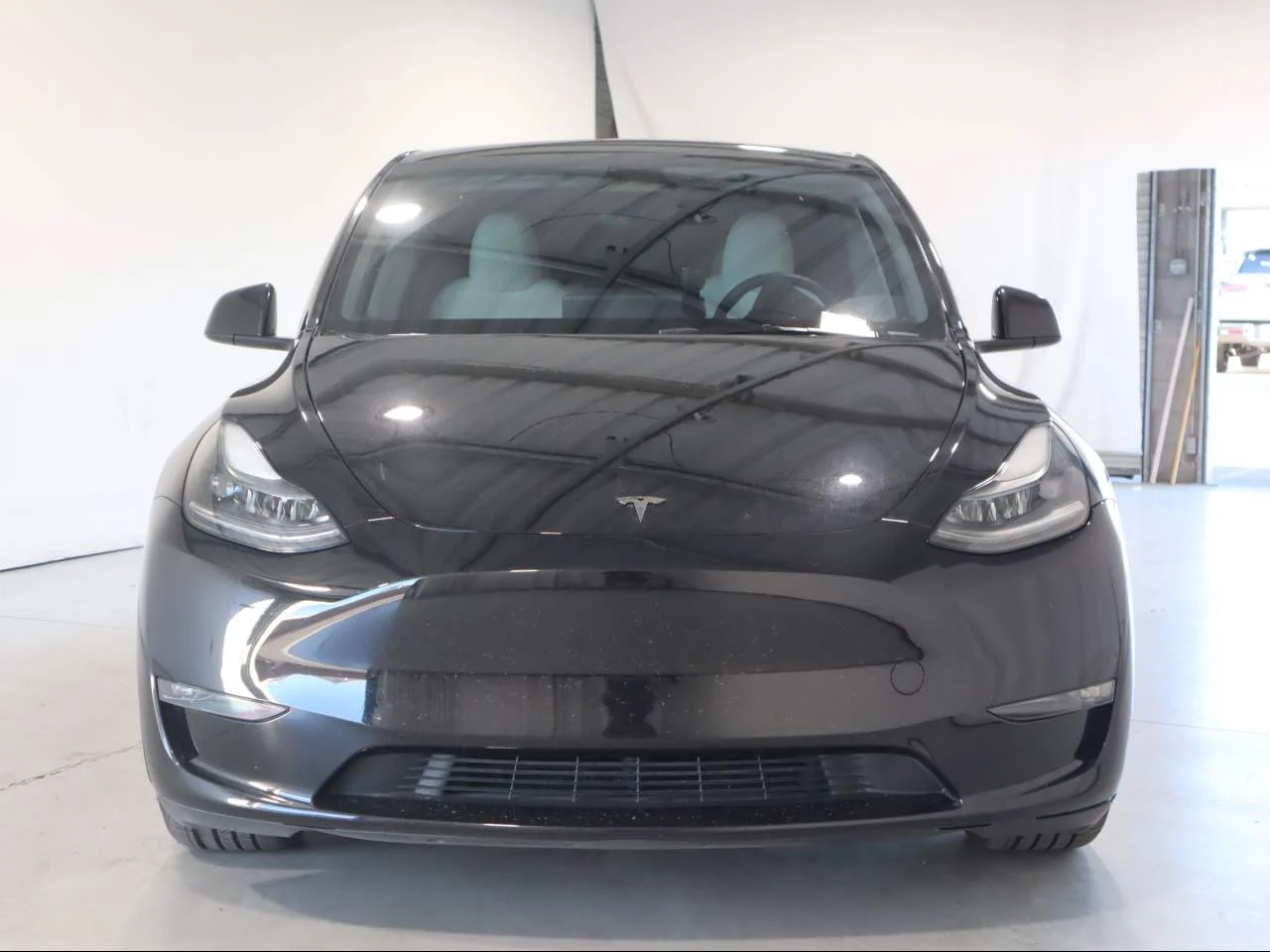 Used 2024 Solid Black Tesla Performance image 2