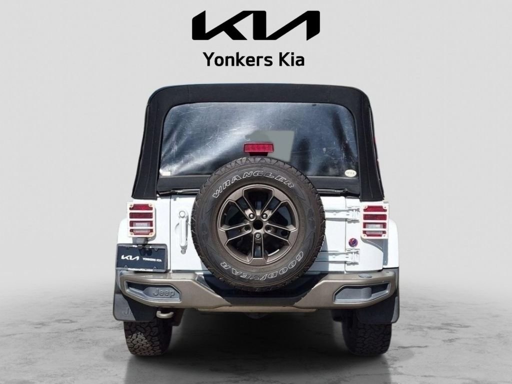 Used 2016 White Jeep Unlimited Sahara image 6