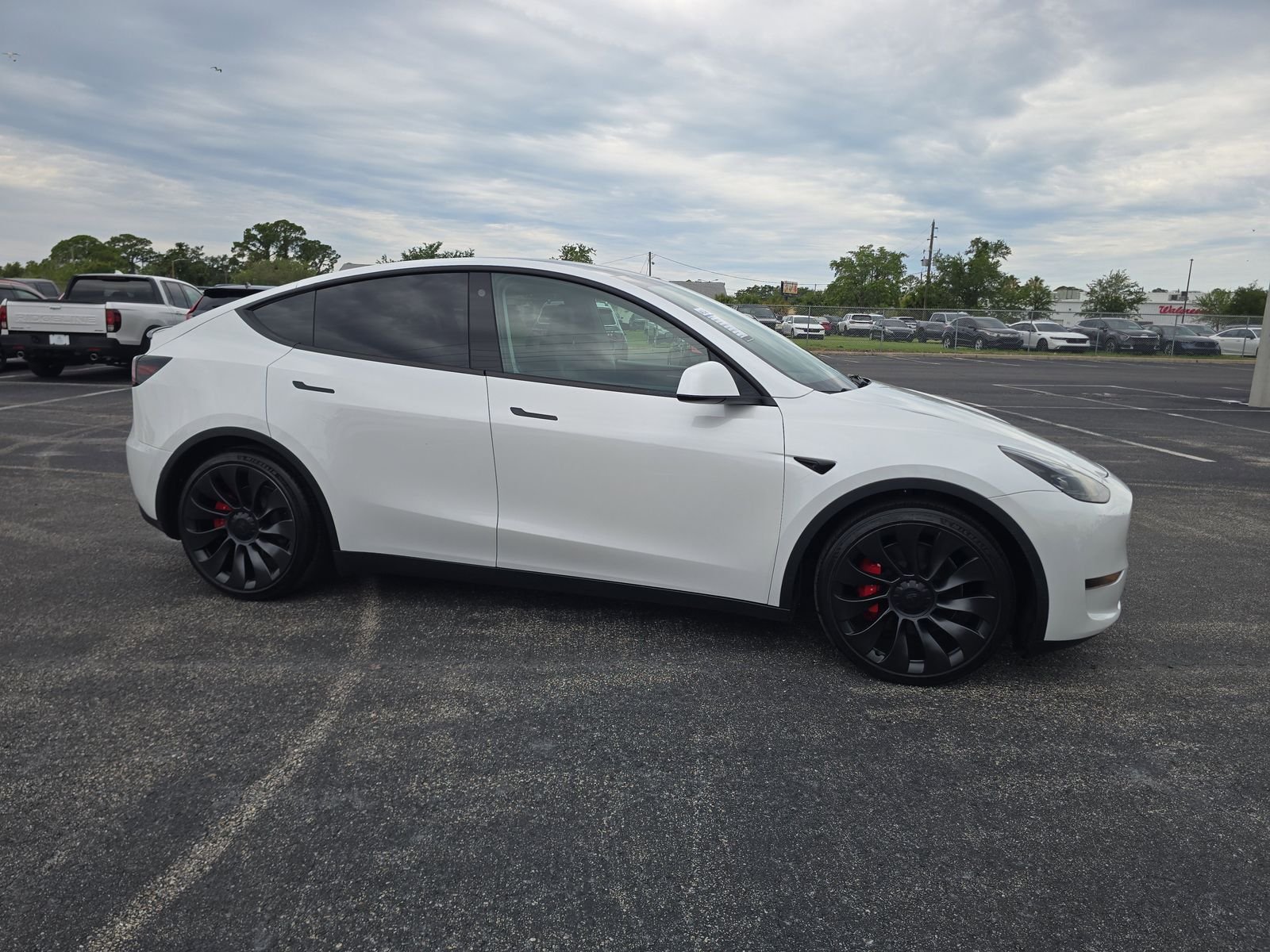 Used 2023 Tesla Model Y Performance with VIN 7SAYGDEF9PF709897 for sale in Port Richey, FL