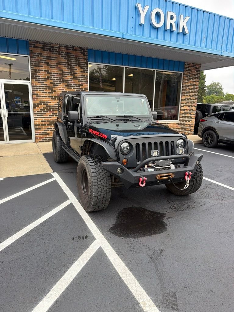 Used 2011 Black Jeep Unlimited Rubicon image 3