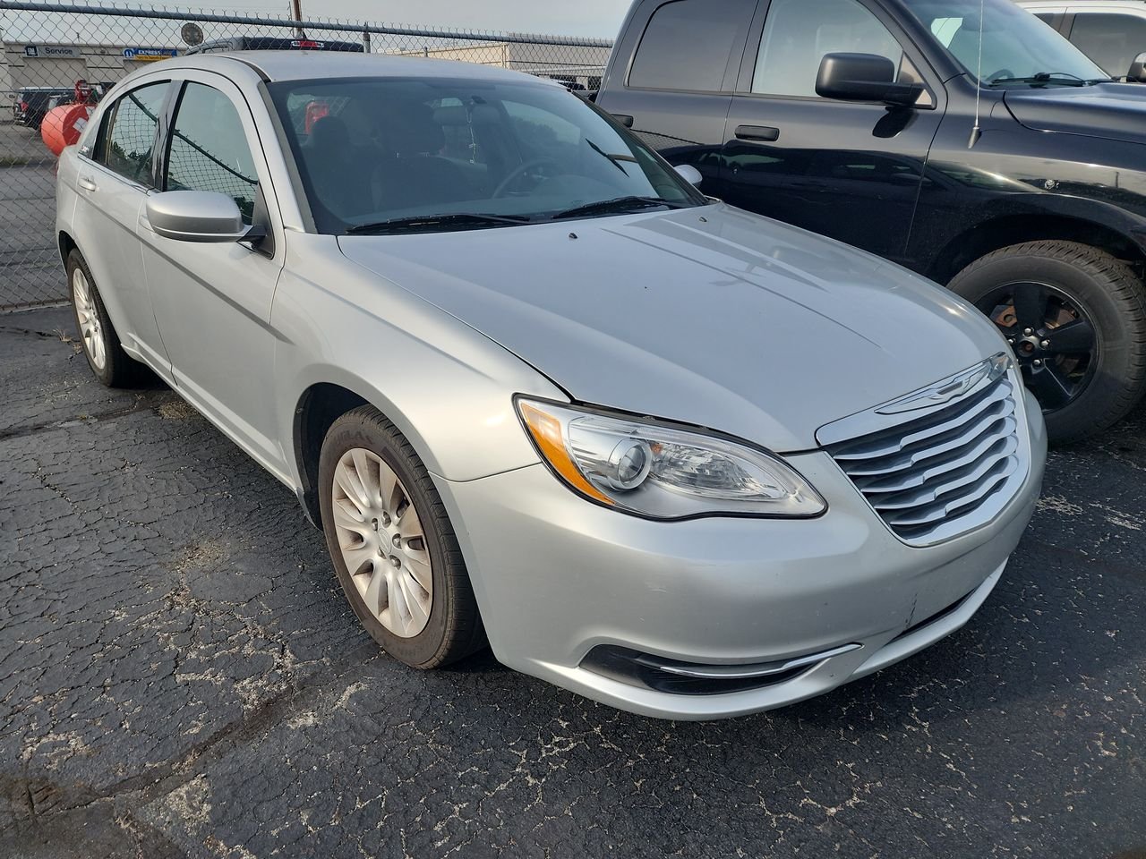 Used 2012 Silver Chrysler LX image 1