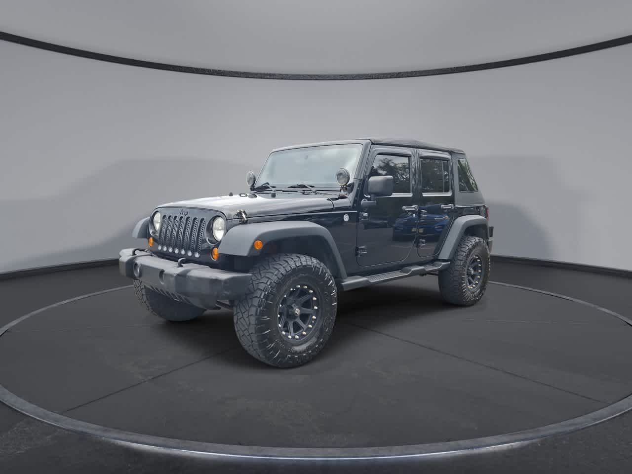 Used 2013 Black Clearcoat Jeep Sport image 4