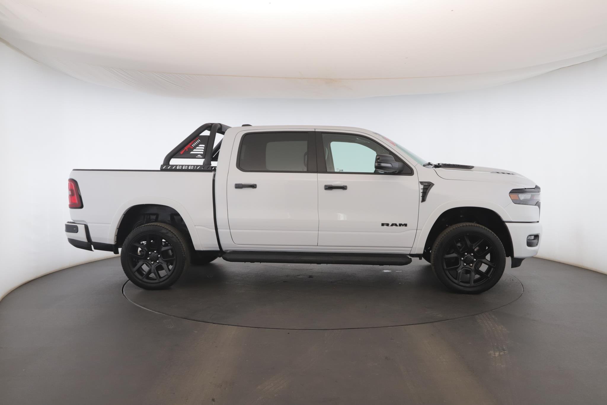 Used 2025 Bright White Clearcoat Ram Laramie 4x4 Crew Cab 5